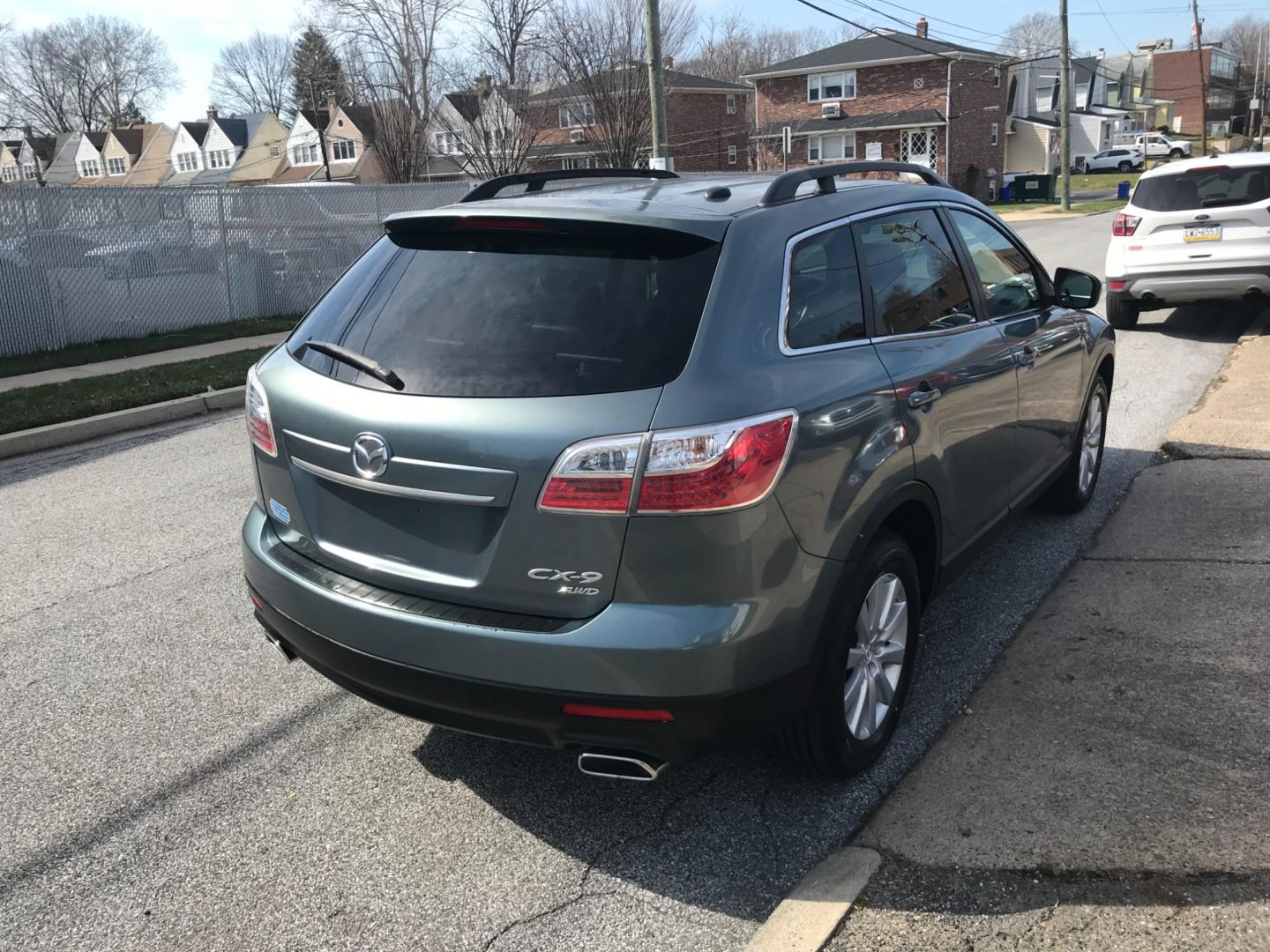 2010 Green /Black Mazda CX-9 Grand Touring (JM3TB3MV7A0) with an 3.7 V6 engine, Automatic transmission, located at 577 Chester Pike, Prospect Park, PA, 19076, (610) 237-1015, 39.886154, -75.302338 - Photo#4